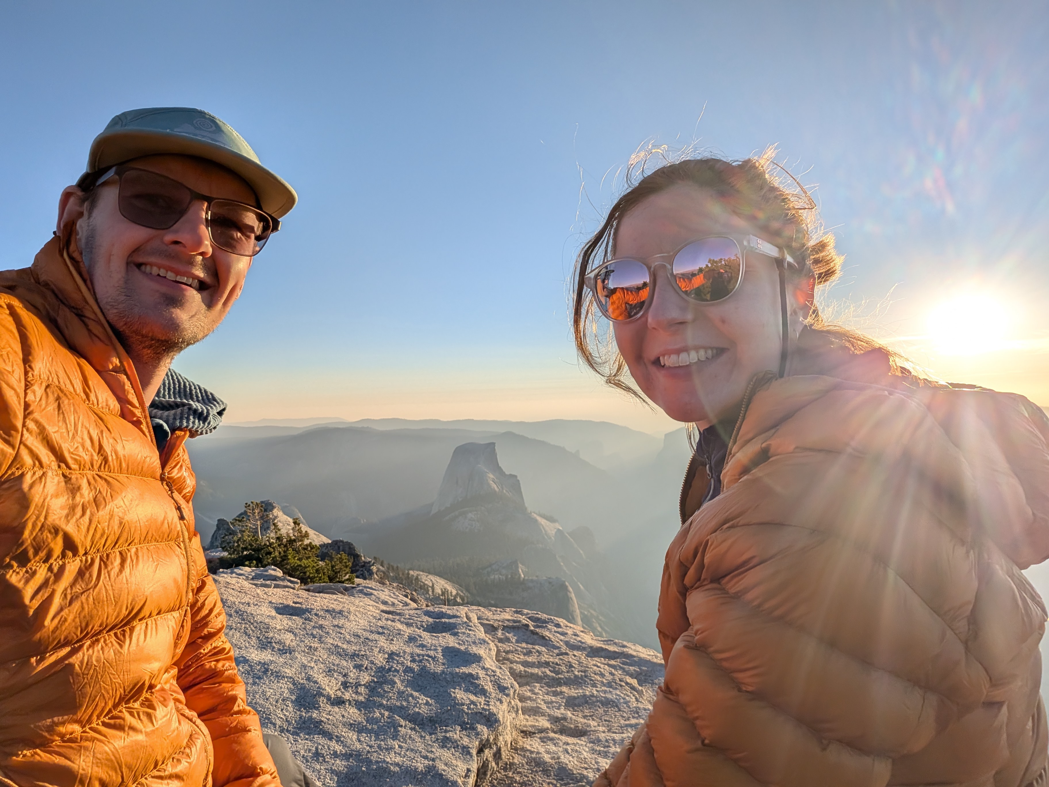 Will and Beth with Half Dome in the background in Yosemite at sunset